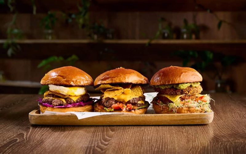 Three-Burgers-with-various-toppings---The-Farm